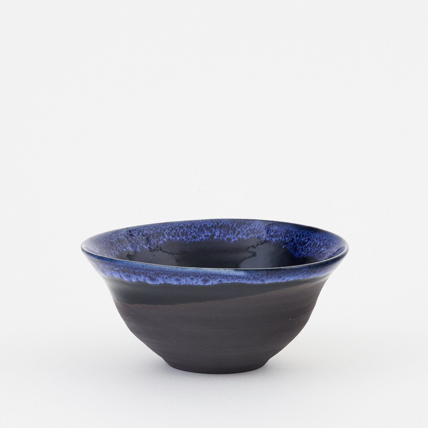 Small onyx black porcelain and cobalt blue fluted waterfall bowl ...