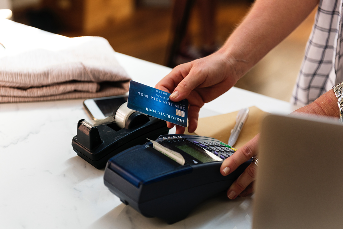 Payment card being used at a POS