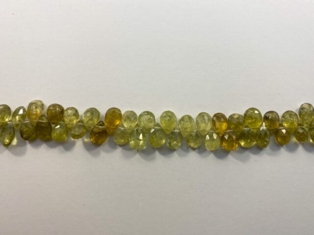 A Grade 68 pcs GrossularGreen Garnet 5x7mm Natural Faceted Top Drilled Flat Teardrop Gemstone Beads