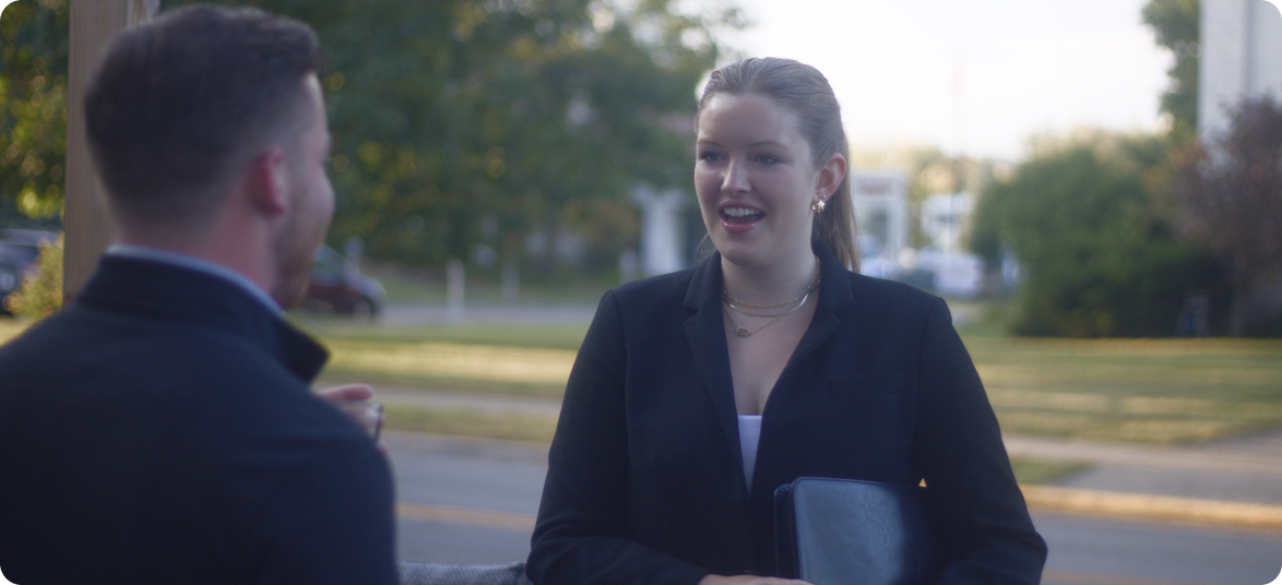 A photo of a member interviewing a fine candidate at Pi Sigma Epsilon's second round interview