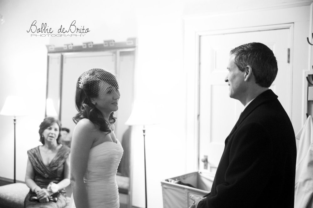 wedding officiant checks in with bride at the Columbus Athenaeum