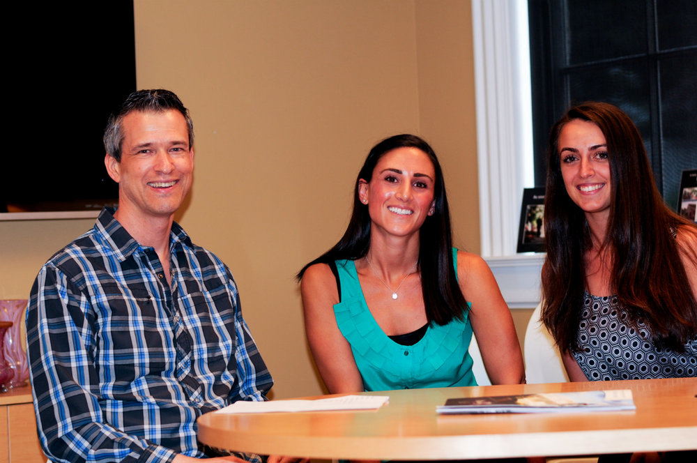 Colleen Tassone and Ariana Tyler meet with wedding officiant Damian King in Columbus