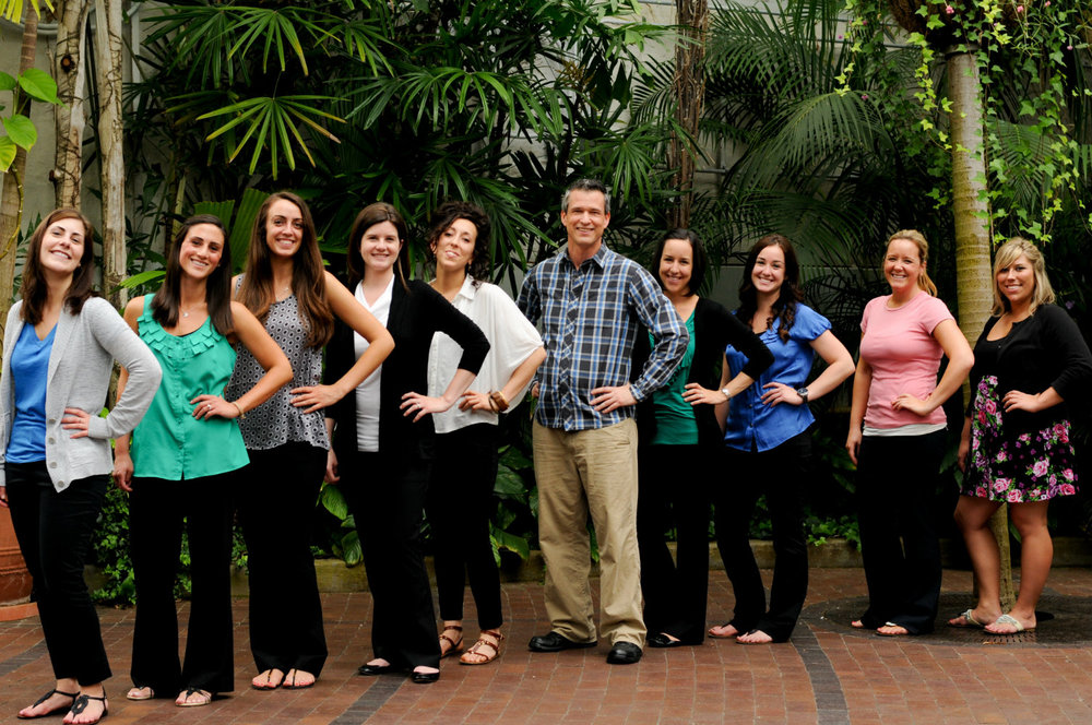 Columbus OH officiant Damian King stands with the wedding professionals of Franklin Park Conservatory 