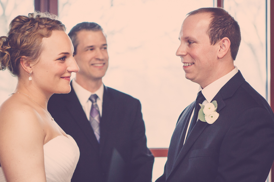 Photographer, Dan Buckley, captures officiant, bride, and groom in Columbus, Ohio
