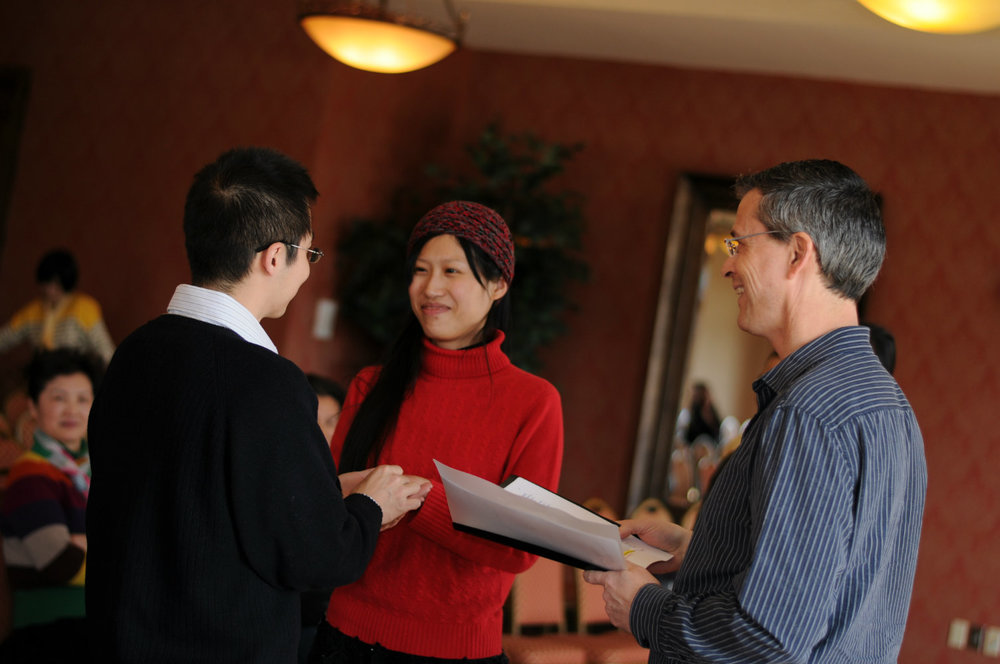 Damian King with bride and groom, Jia Shi and Bin Zhu, for United Marriage Services LLC