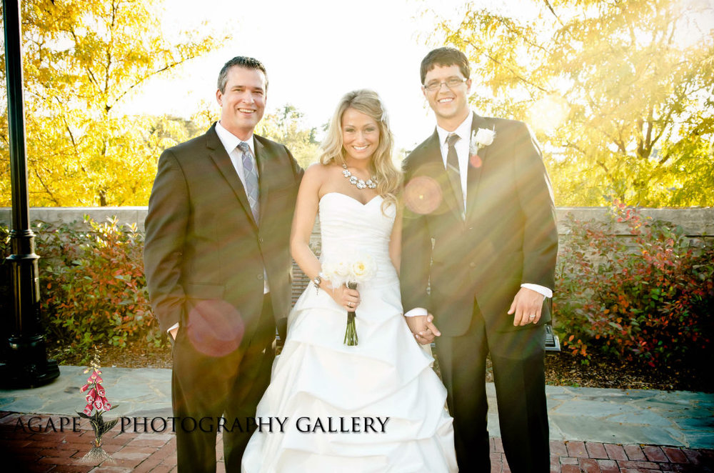 Columbus, Ohio wedding, officiant, Damian King, stands with bride and groom at North Bank Park