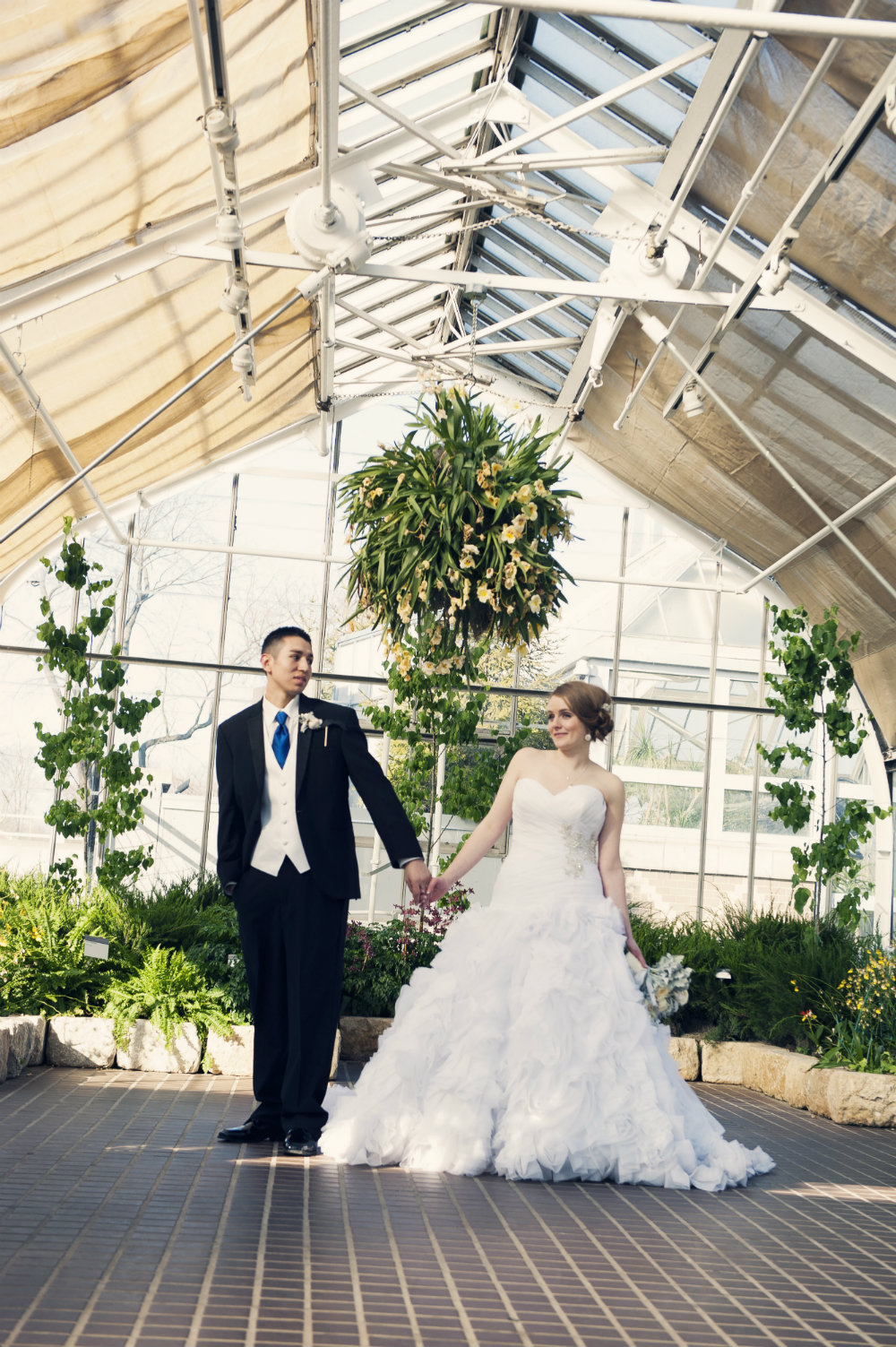Rachel & Elias share moments in Columbus OH at wedding at Franklin Park Conservatory