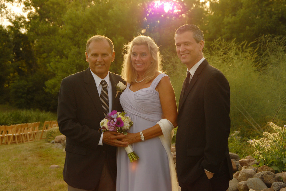 Marriage officiant Damian King stands with Darlene and Don near Columbus Ohio