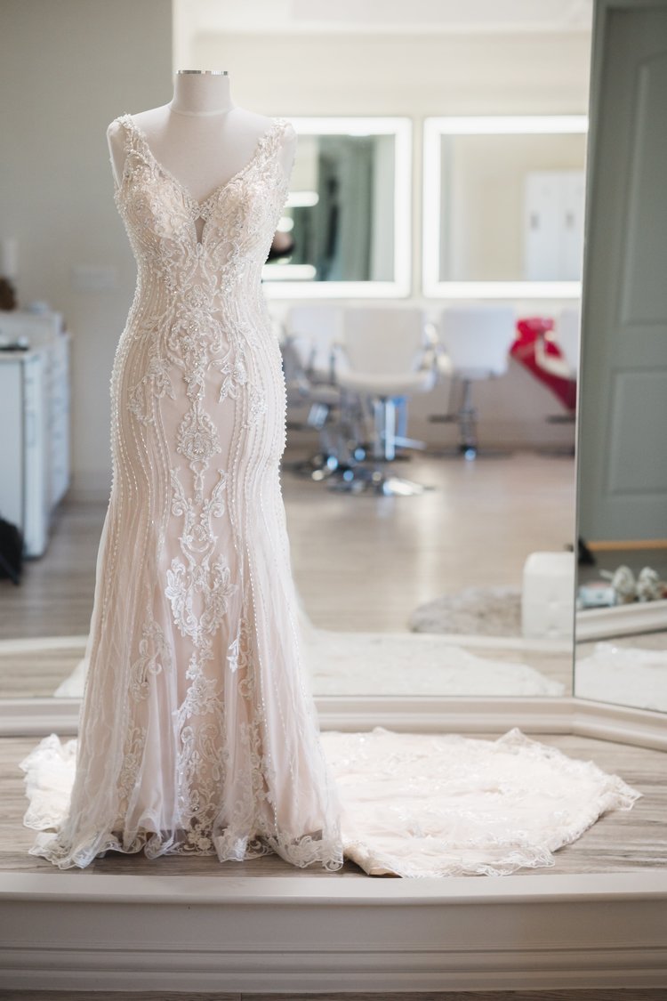 Sleek, Modern, Off-White Wedding Dress With Embroidery.
