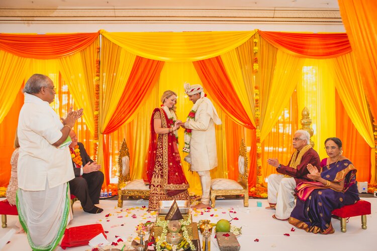 Bi-Cultured Couple Performing A Traditionally Indian Wedding Ceremony.