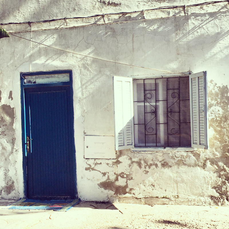 blue door and white walls