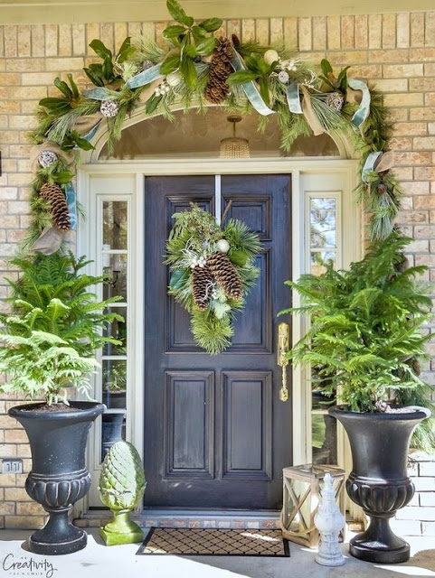 front door garland pinecones and greens