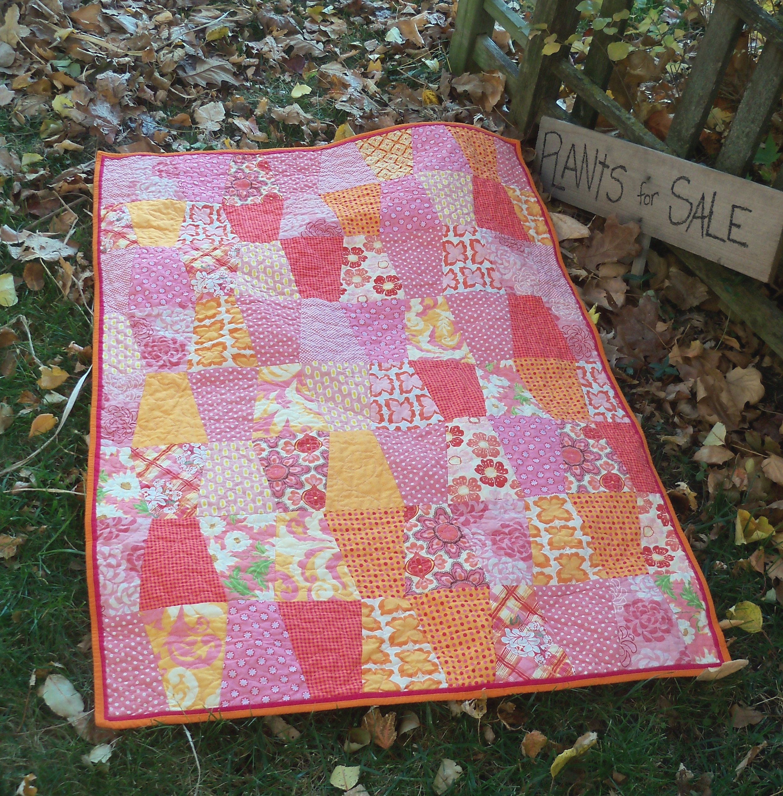 orange pink tumbler quilt.JPG