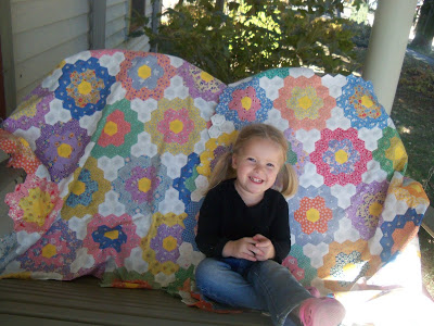 little girl grandmother flower garden quilt.jpeg