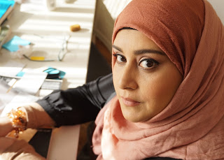 Sajidah in pink hijab giving strong side eye
