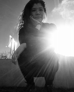 black and white image of Tanaya with sunburst