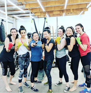 Maurene with friends at boxing class