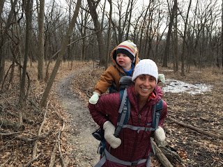 rachel hiking with son in back carrier