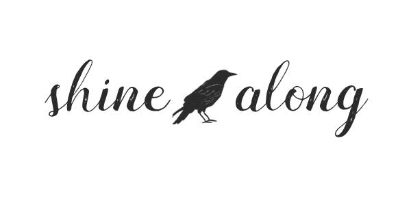 shine along crow logo