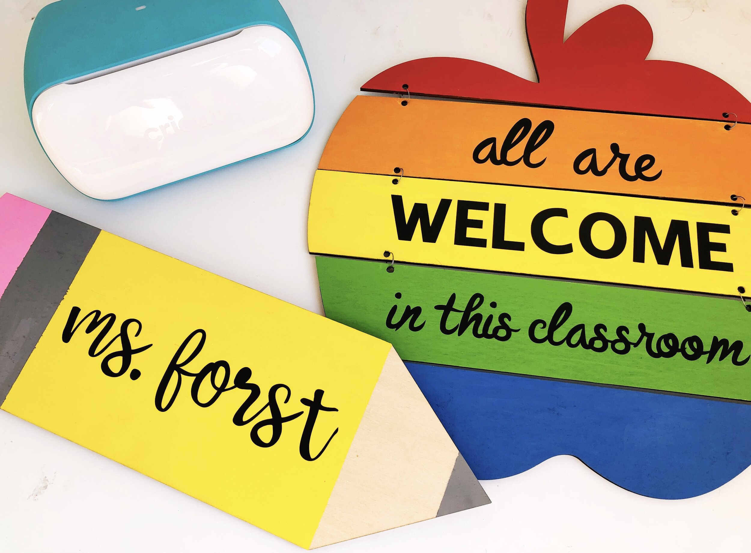 Apple and pencil classroom signs made with Cricut