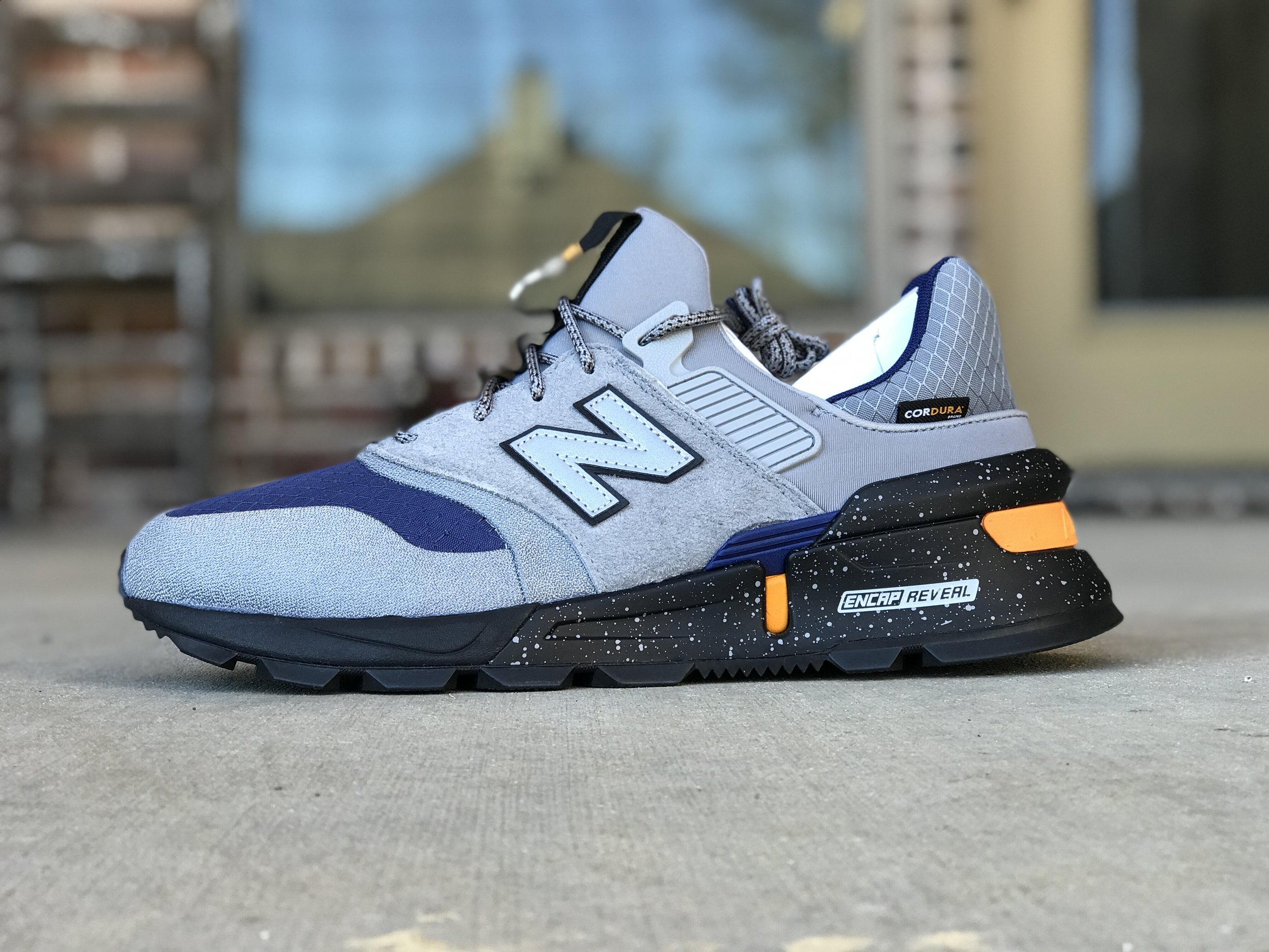 new balance 997 grey on feet