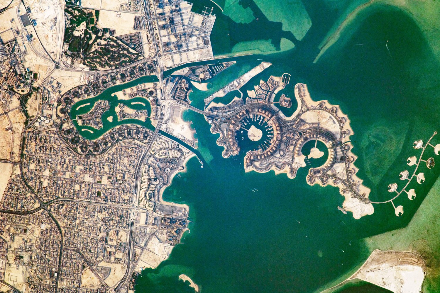 artificial islands off the coast of Qatar were made possible by abundant oil and natural gas reserves