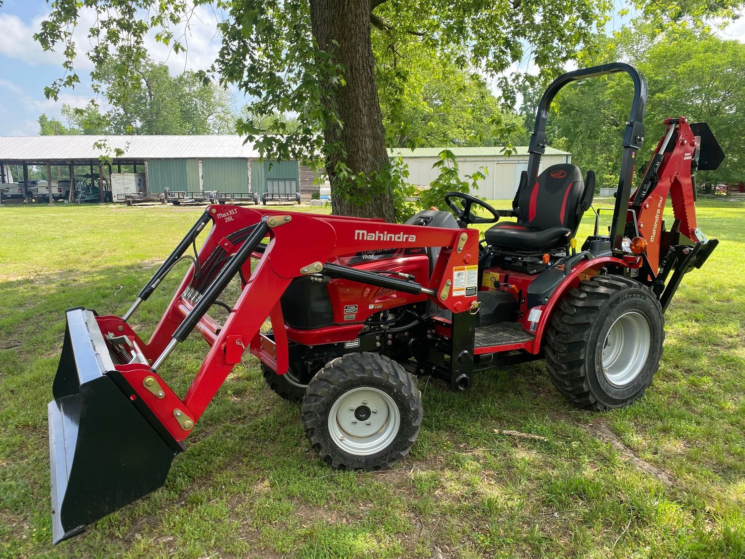 Mahindra Max 26 XLT HST with Backhoe — Yell County Gin Co.