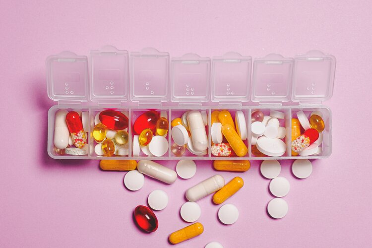 clear-plastic-container-and-medicine-capsule-3683051.jpg