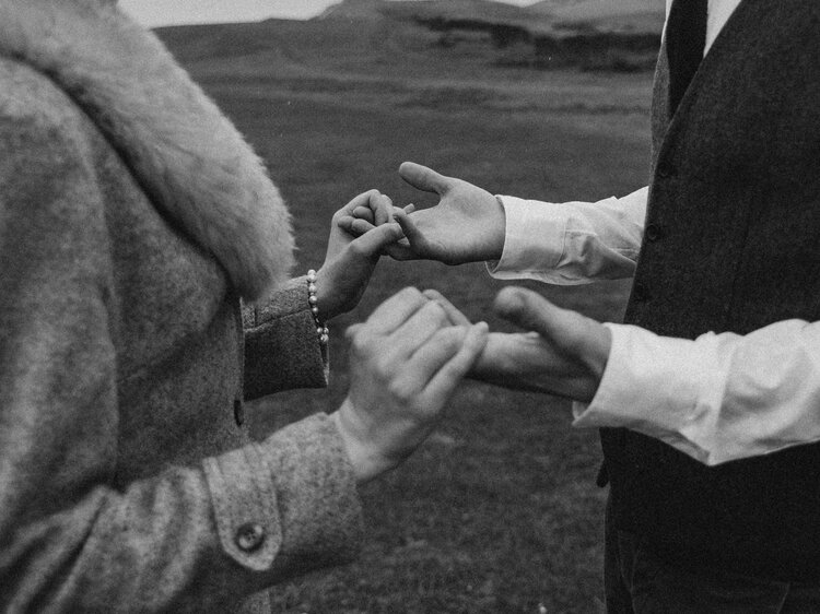 monochrome-photo-of-people-holding-hands-3617547.jpg