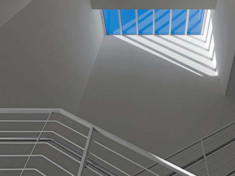 stairwell with skylight shadows