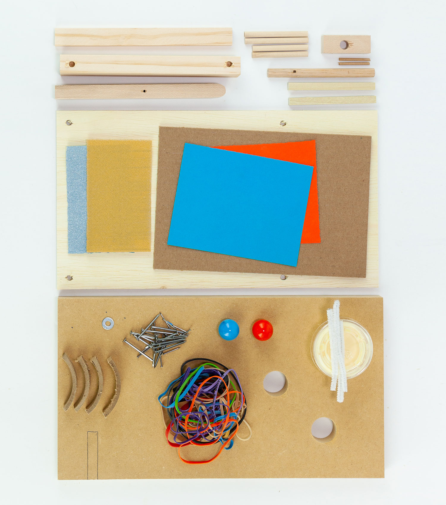 Wooden components to be assembled into a fun project kit. On mouseover: An assembled Marble Maze kit