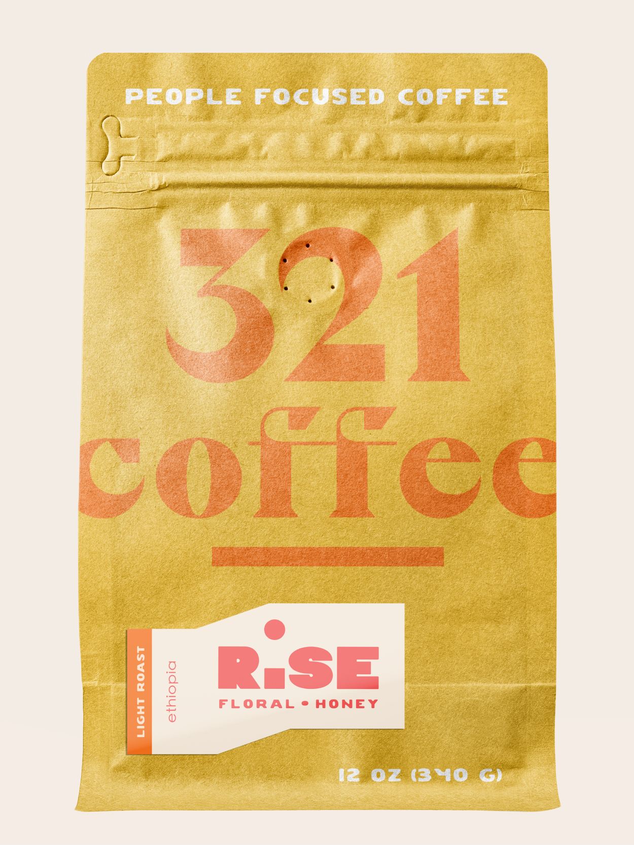 An image of 321's Rise coffee. When hovered over, the text Rise Light Roast, Floral and Honey, Ethiopia, appears above the bag.