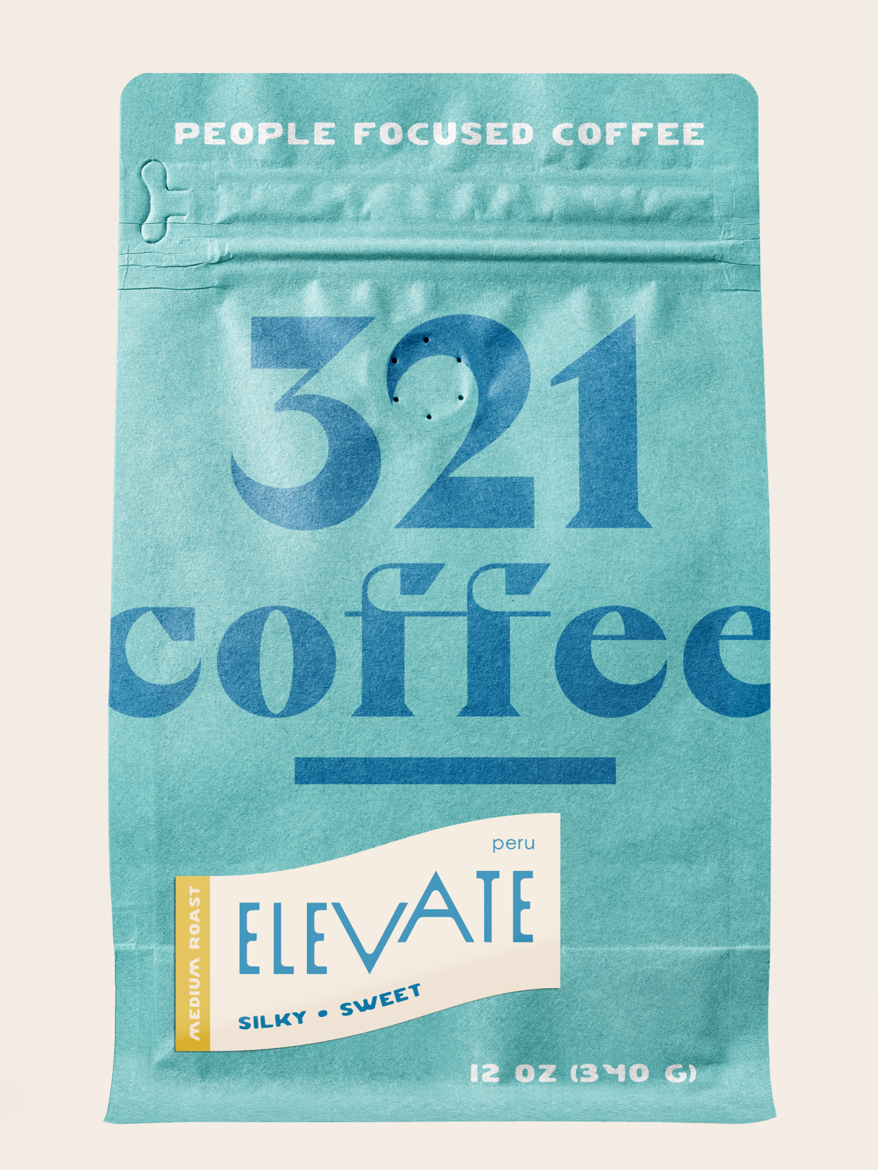 An image of 321's Elevate coffee. When hovered over, the text Elevate Medium Roast, Silky and Sweet, Peru, appears above the bag.