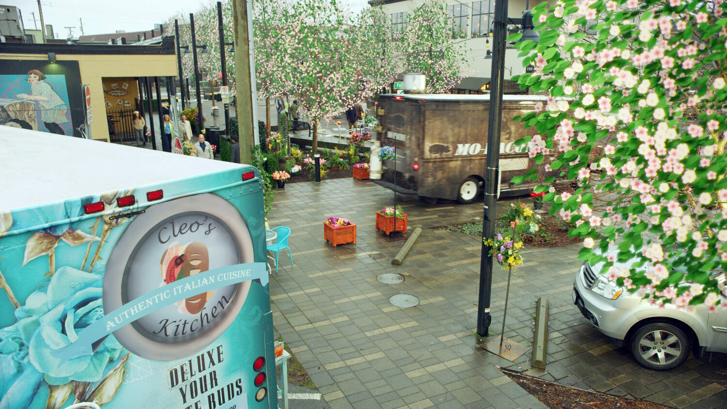 Establishing shot of food trucks with spring blossoming trees for the film You're Bacon Me Crazy, with VFX completed by Foxtrot X-Ray