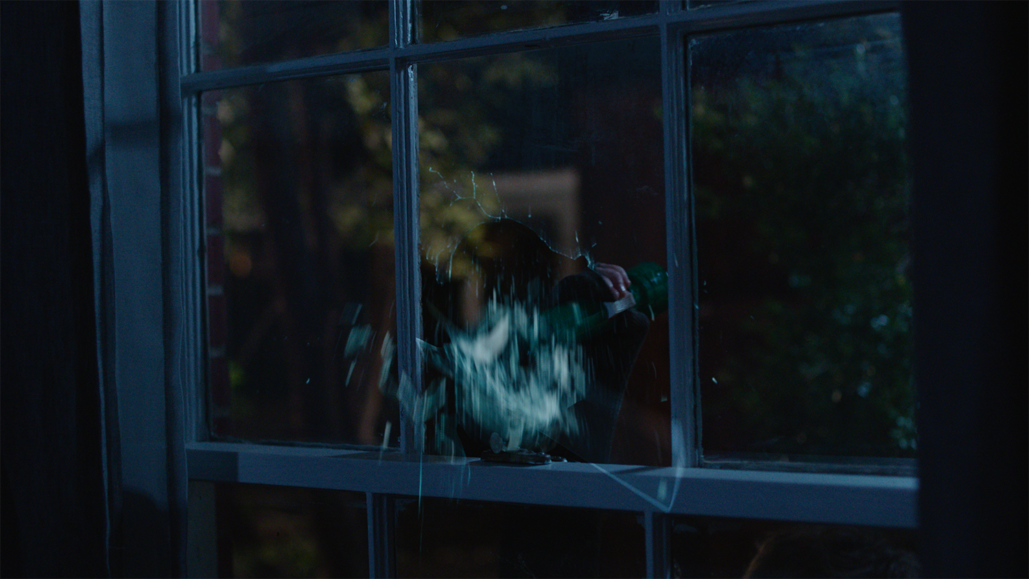 A flashlight is used to shatter a window in an episode of Cruel Summer, with VFX completed by Foxtrot X-Ray