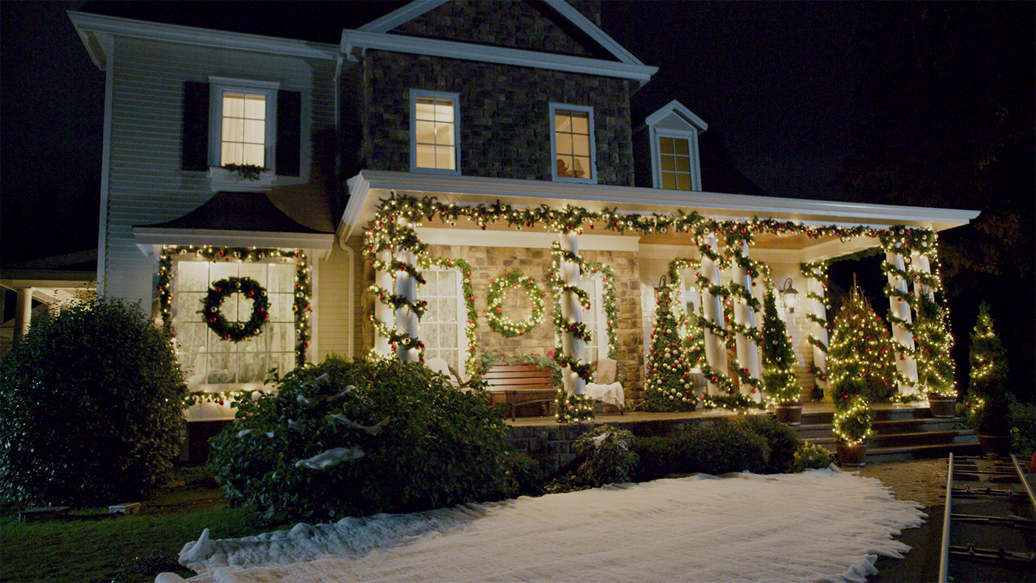 A house decorated for Christmas from the film A Dickens of a Holiday