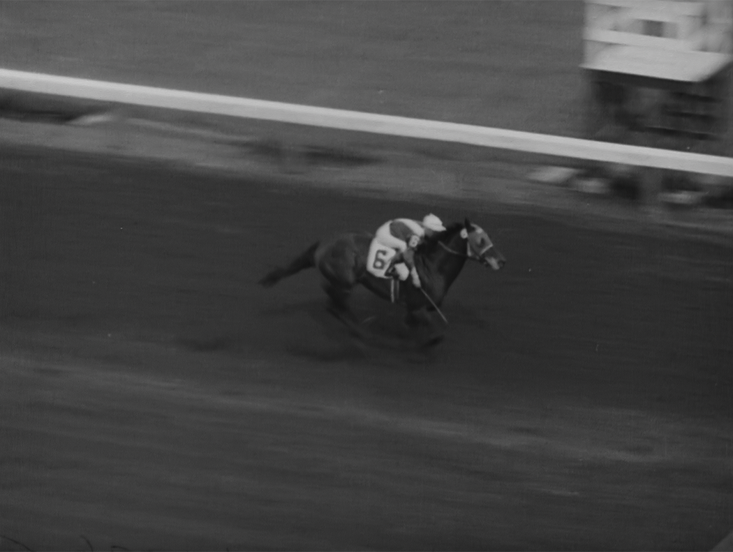 Archival footage of a horserace used in the film The Fiddling Horse