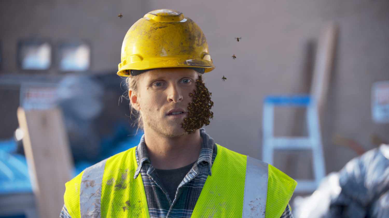 Closeup of a construction worker with digital bee VFX completed by Foxtrot X-Ray