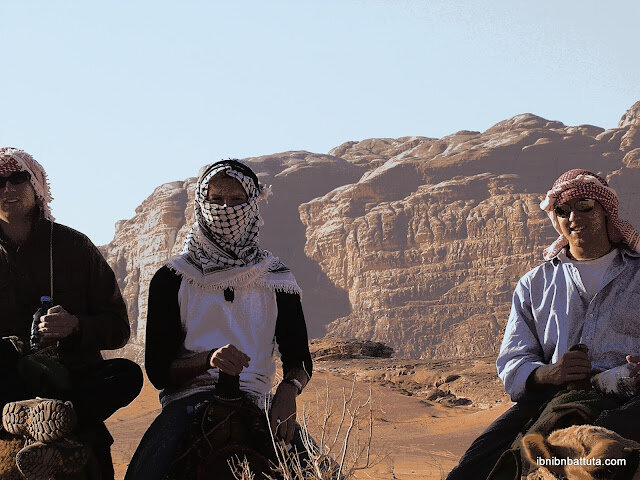 Tom, Sami, and Andrew on camelback in Petra, Jordan.