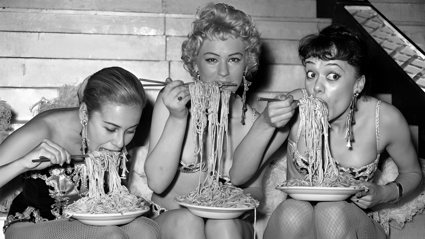 Three Ladies Eating Pasta