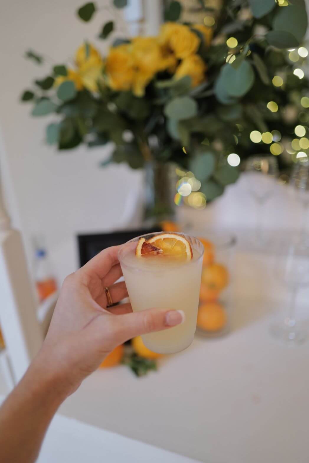person holding frozen margarita gold tequila mix