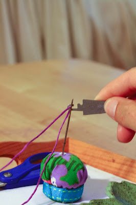 Montessori 'Threading a Needle' activity tray for children