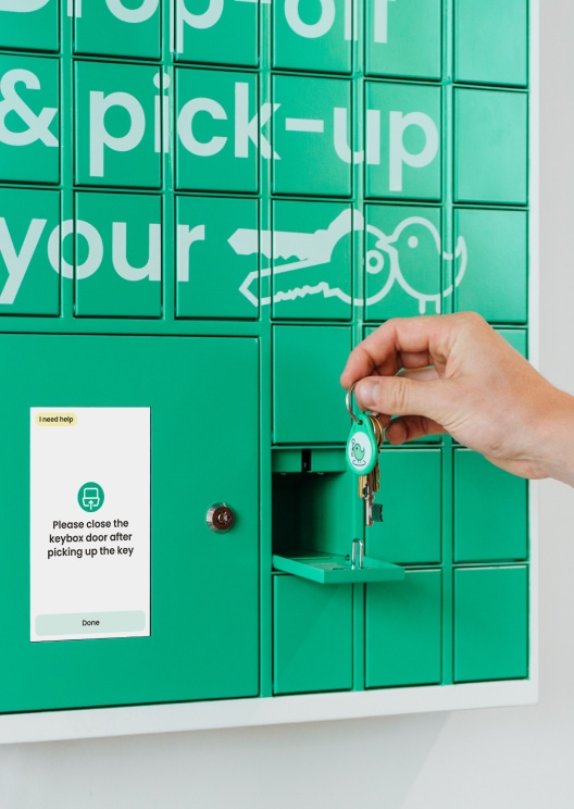 Key being collected from KeyNest locker