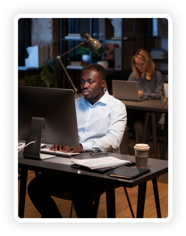 black man using computer